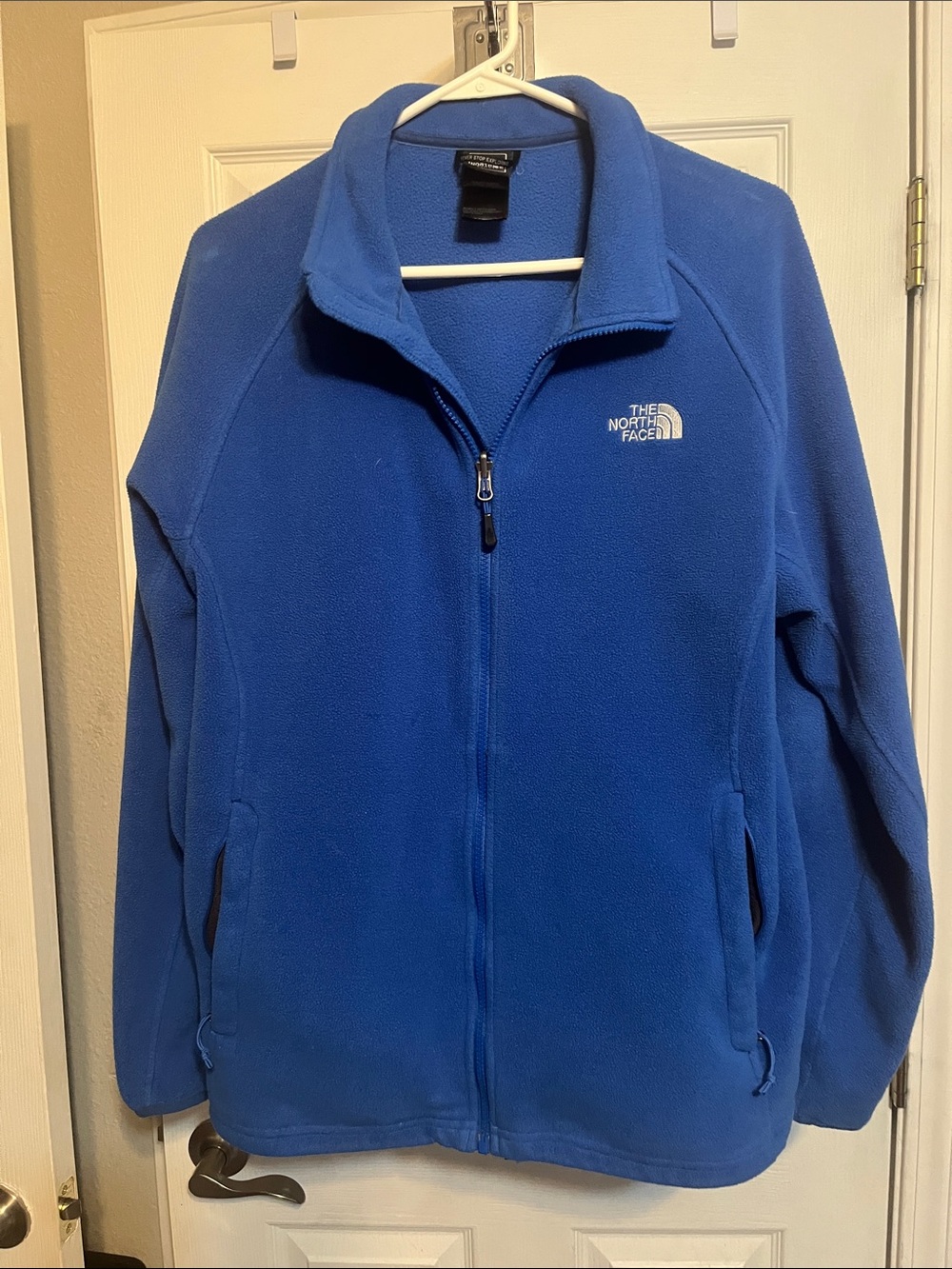 The North Face Navy Blue Fleece Jacket with  Logo